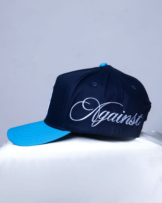 Navy SnapBack ‘Against’ Hat